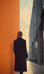 the young woman is walking up the walkway