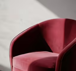 a chair that is red with the seat up