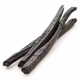 several pieces of black chocolate on white background
