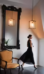 a woman wearing a dress is walking past an ornate mirror