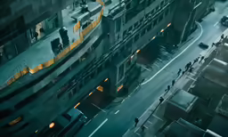 a city street with a bunch of people and cars on it