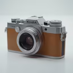 an old camera sitting on a white table