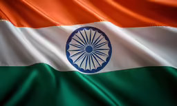 india flag flying in the wind on a white and green background