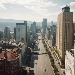 a view of a busy city street near tall buildings