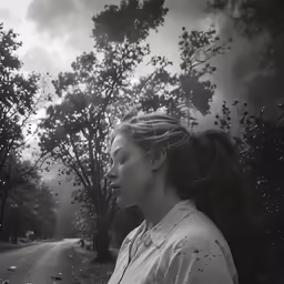 a woman is walking down the street
