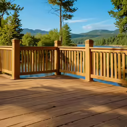 a wooden bridge with rail and rail with a view of the river