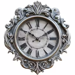an ornate silver clock is shown in the wall