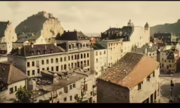 the view of a bunch of buildings in town from above