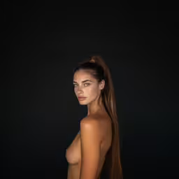 an oil - painting of a nude woman with long hair,naked woman with beautiful hair posing naked in dim light
