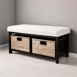 a black bench with baskets under the foot