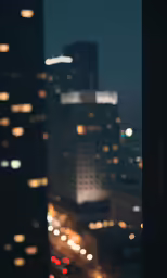 a dark city night view shows bright street lights