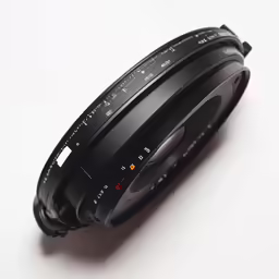 a camera lens is shown sitting on a table