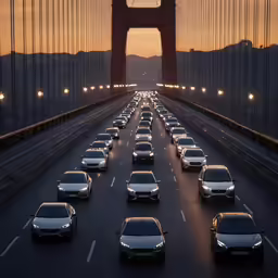 a bunch of cars are driving on the highway