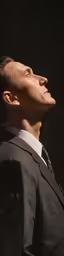 there is an unzipped profile of a young man