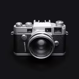 a silver camera with an empty lens and no background