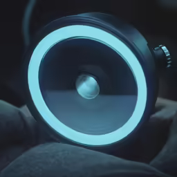 closeup of an electric speaker in the middle of the seat