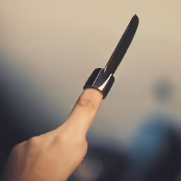 person taking a call with a cell phone