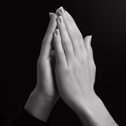 two hands holding each other with black background