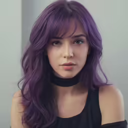 young woman with vibrant purple hair and black dress posing for photo