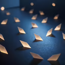 white paper airplanes lined up and folded into shape