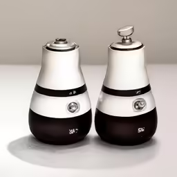 two black and white items on a table