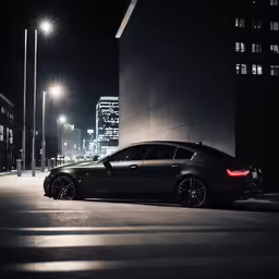 a car parked on a street in the city at night