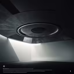 a circular ceiling light fixture inside a dark room