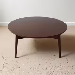 a table sitting on top of a white rug