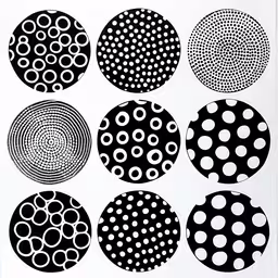 nine circles in black and white with dots,many circles with different types of dots
