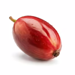 an apple has a yellow tip on it