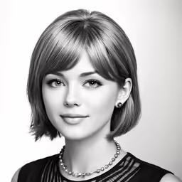 a black and white photo of a woman with short hair