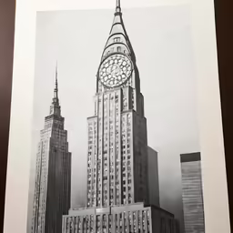 an ornate clock and the rockefeller building in new york