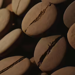 a pile of chocolate cookies and some coffee beans
