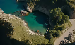 a small island that is surrounded by mountains