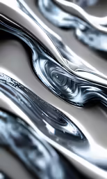 the image is close up and shows a curveed pattern of silver