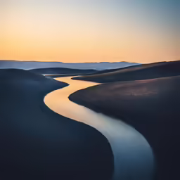 there is a small river running through a plain