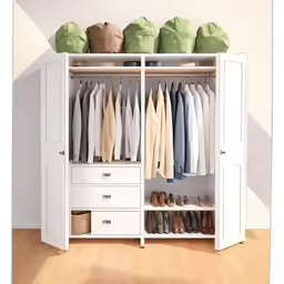 an empty closet with shoes and clothes on it