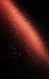 a bright red and black wallpaper with many little stars