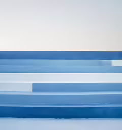 a skiboard is leaning against the side of an iceberg