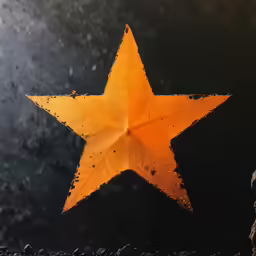 a star with some spots on it on the wall