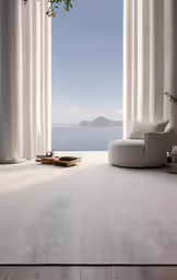 an empty, white living room with an open window