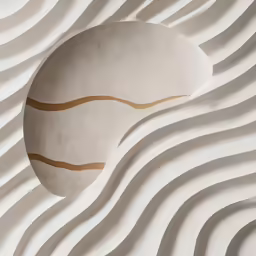 an abstractally painted rock is shown in the center of the image