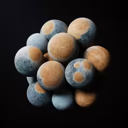 several round stones with yellow and white dots on them