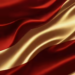 a close up view of a red, white and gold flag