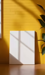 there is a yellow brick wall next to a white box