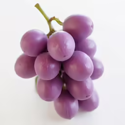 several grapes in the middle of their bunch