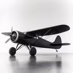 an airplane sitting on top of a gray floor