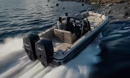 two people in a motor boat driving across a body of water