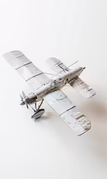 model of small air plane on white background