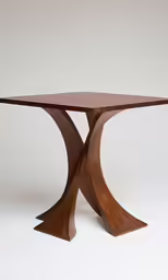 the table has two curved sections on it